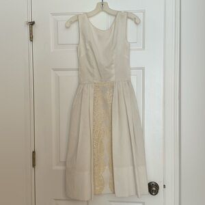 Vintage 1960’s Sleeveless boatneck cream swing dress with lace. HANDMADE.